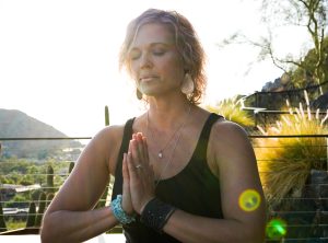 shannon sondrol sitting in yoga position